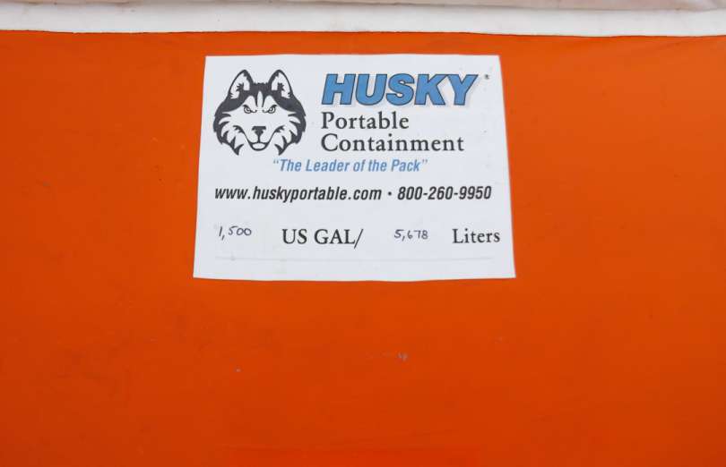 A Husky Portable Containment self-supporting onion tank