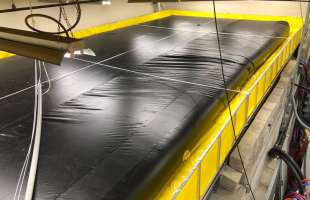 A husky bladder tank sitting inside a husky folding frame tank for extra spill protection