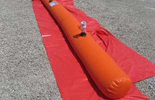 A husky Easy Dam large diameter water dike