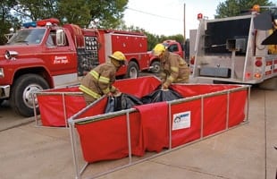 Easy lift handles make folding up your tank and packing up easy