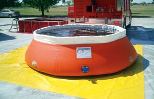 Ground cover with self-supporting tank
