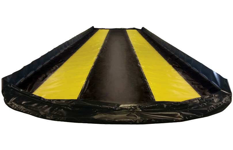 The yellow stripes on this Husky Freedom Series IV Aluminum Angle Berm help drivers stay in the berm when pulling in