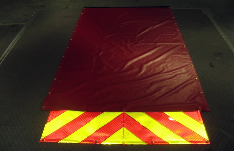 Hose bed cover with reflective edge