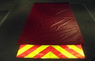 Hose bed cover with reflective edge