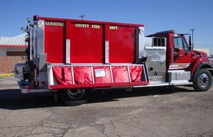 Husky Tank Racks fit to the side of your tanker for easy transport for your Folding Frame Tank