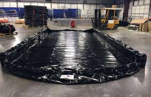 A Husky Liberty Berm set up in a warehouse