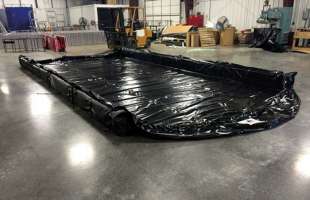 A Husky Liberty Berm set up in a warehouse