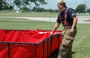 A firefighter demonstrates Husky\\\\\\\\\\\\\\\\\\\\\\\\\\\\\\\\\\\\\\\\\\\\\\\\\\\\\\\\\\\\\\\\\\\\\\\\\\\\\\\\\\\\\\\\\\\\\\\\\\\\\\\\\\\\\\\