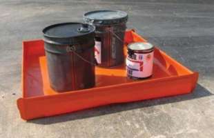 A Husky spill containment tray holding cans of paint