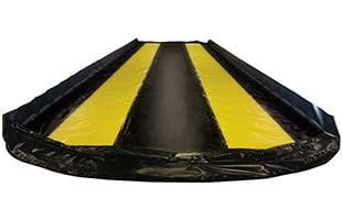 The yellow stripes on this Husky Freedom Series IV Aluminum Angle Berm help drivers stay in the berm when pulling in
