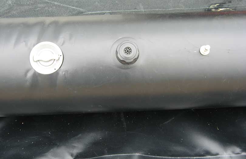 A Husky® bladder tank with Fittings and Valves.