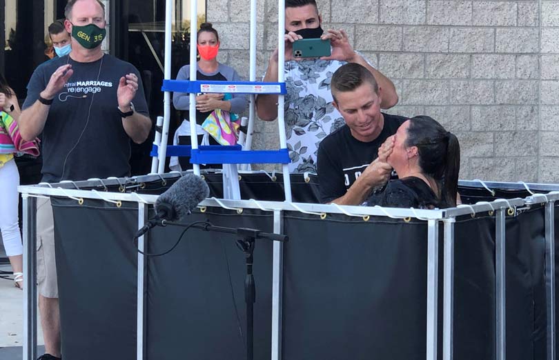 A Husky portable baptismal pool in use