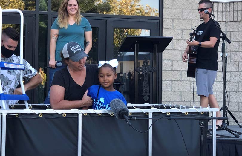 A Husky portable baptismal pool in use