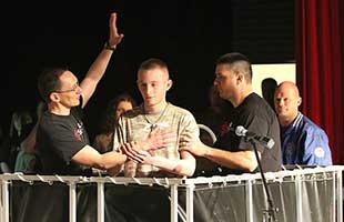 A Husky portable baptismal pool in use inside a church.